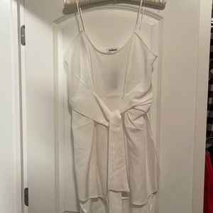 Express white tie front tank with open side slits. NWT